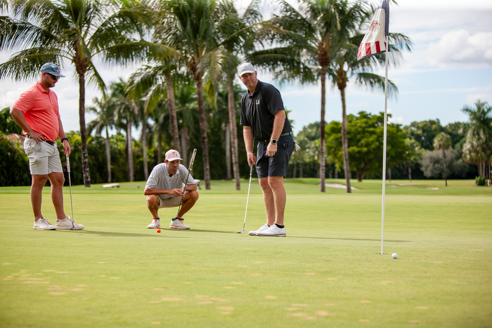 Players reading a putt